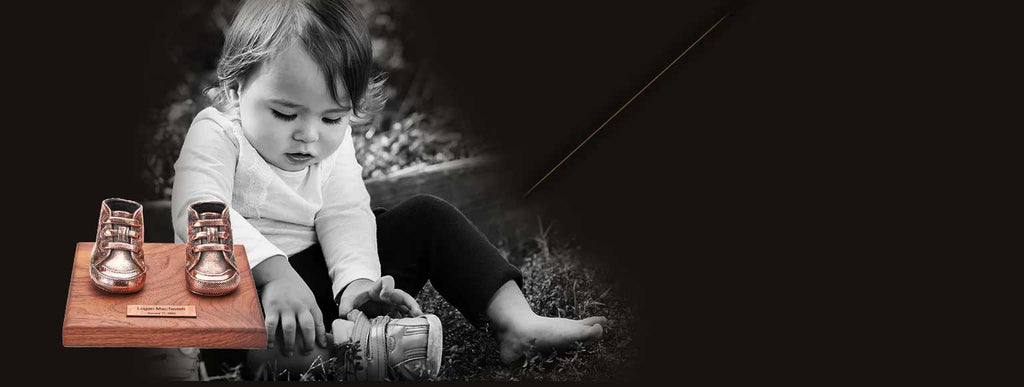 Bronze baby shoes keepsake created from original childhood shoes to preserve a family memory as a custom legacy heirloom